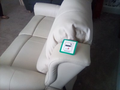 3 seater cream leather reclining sofa.