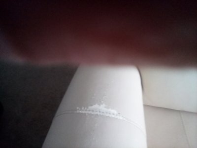 3 seater cream leather reclining sofa.