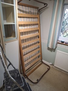 Guest bed with folding legs and mattress