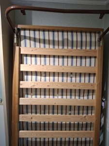 Guest bed with folding legs and mattress