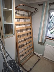 Guest bed with folding legs and mattress